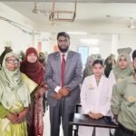 গ্লোবাল নার্সিং কলেজ রাজশাহীতে ক্যাপ সিরিমনি অনুষ্ঠানে শিক্ষার্থীদের ক্যাপ পরিয়ে দিচ্ছেন শিক্ষকরা